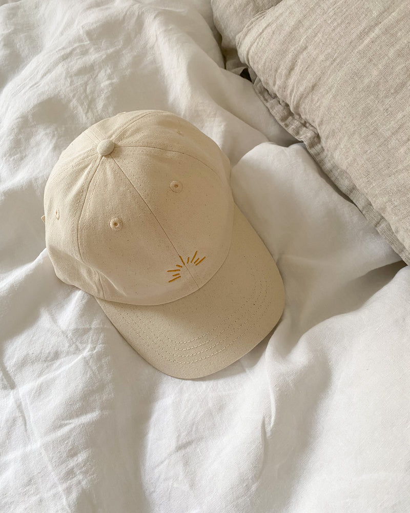 The July Co undyed 100% organic cotton cap with logo embroidery to the front and back.